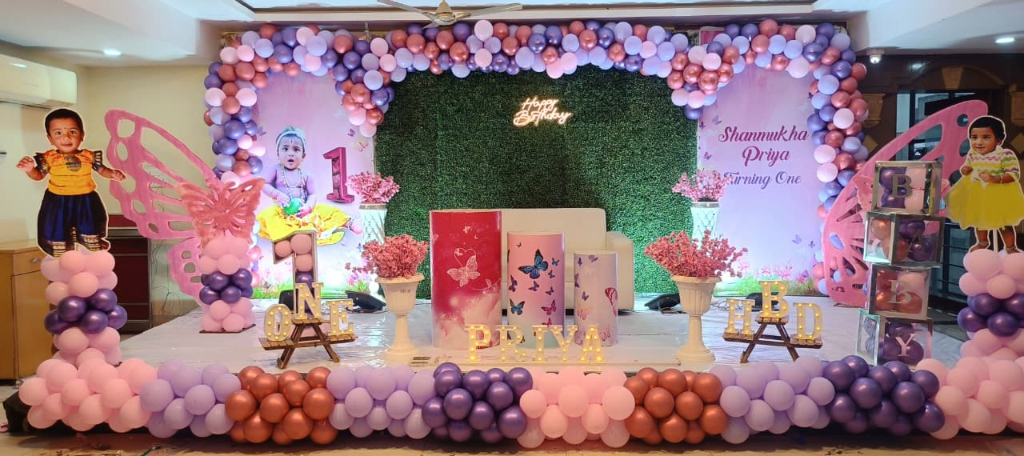 Shanmukha Priya Turning One Pink Butterfly & Rose Gold Stage
