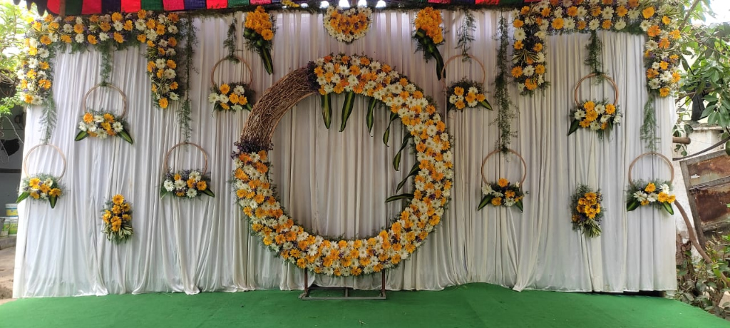 White Satin Daisy Wreath Arch Engagement & Reception Stage